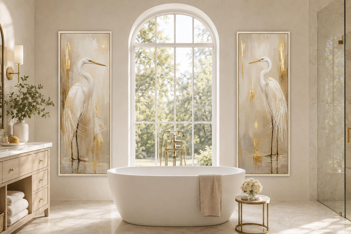 Set of 2 tall narrow canvas prints featuring white egrets with gold accents in a modern bathroom.