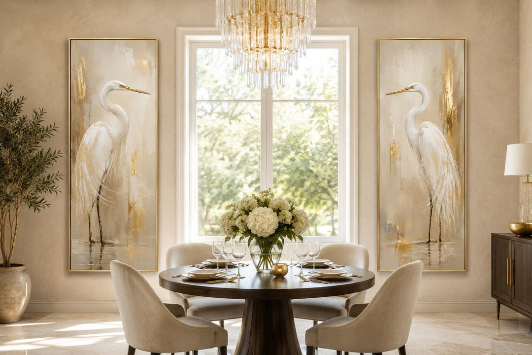 Set of 2 tall narrow canvas prints featuring white egrets with gold accents in a dining room.
