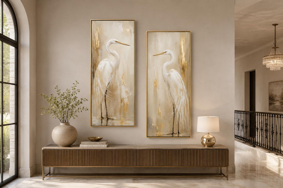 Set of 2 tall narrow canvas prints featuring white egrets with gold accents in a modern entryway.
