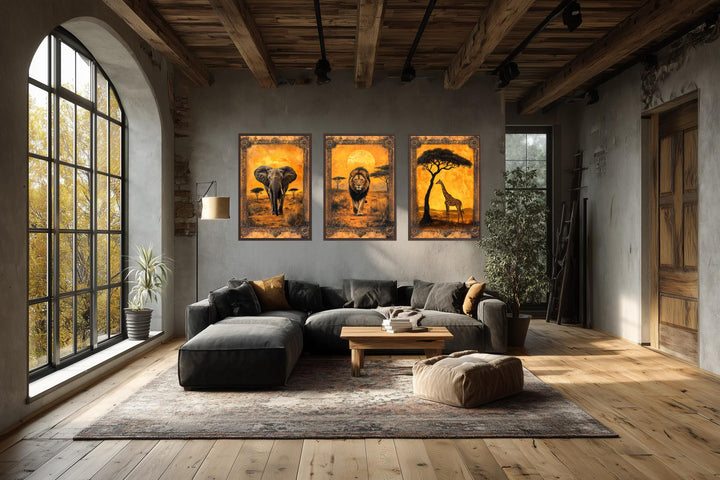 Set of 3 African animal wall art panels featuring an elephant, lion, and giraffe in a savanna.