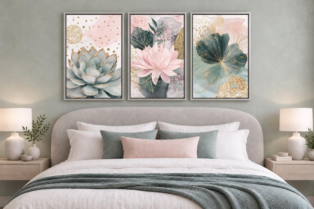 Set of 3 blush pink and teal succulent floral framed canvas wall art hanging above a bed.