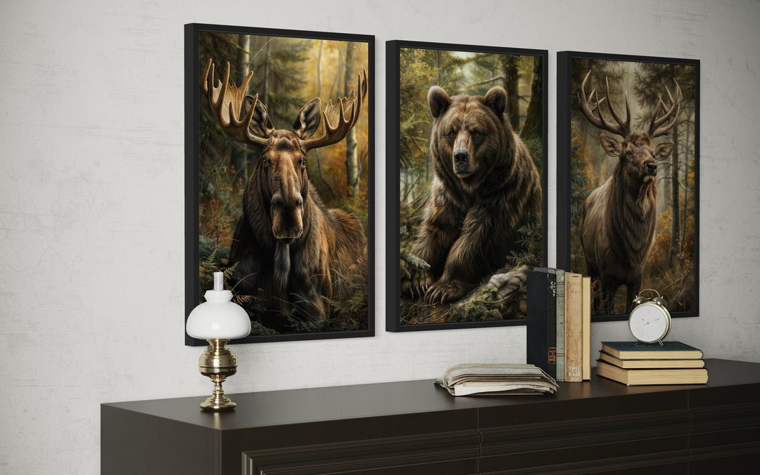 Set of 3 framed canvas prints featuring detailed paintings of a moose, a bear, and an elk.