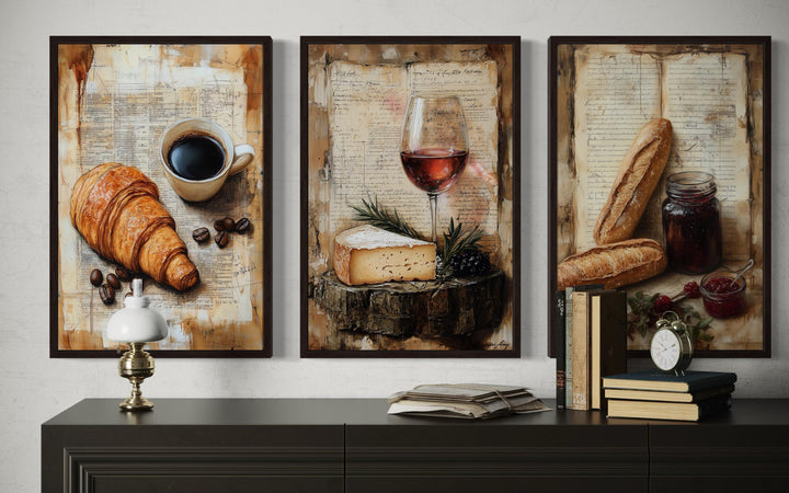 Set of 3 framed prints featuring a croissant, coffee, wine, cheese, and baguettes on recipe pages.