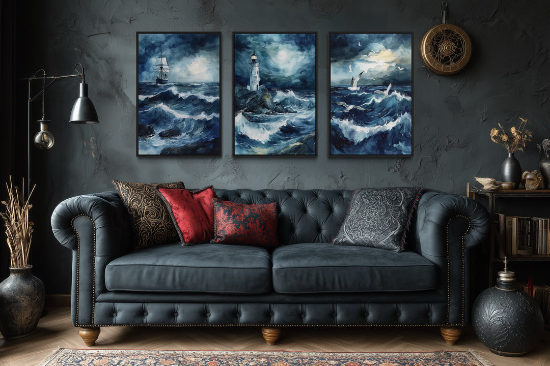 Set of 3 framed canvas prints featuring a lighthouse, sail ship, and seagulls in a stormy ocean.