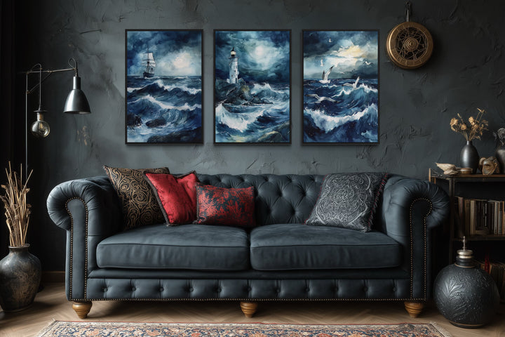 Set of 3 framed canvas prints featuring a lighthouse, sail ship, and seagulls in a stormy ocean.