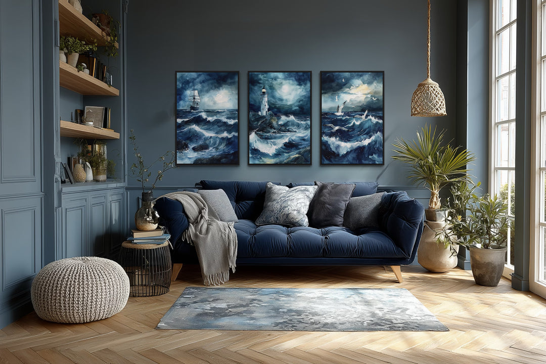 Set of 3 framed canvas prints featuring a lighthouse, sail ship, and seagulls in a stormy ocean.