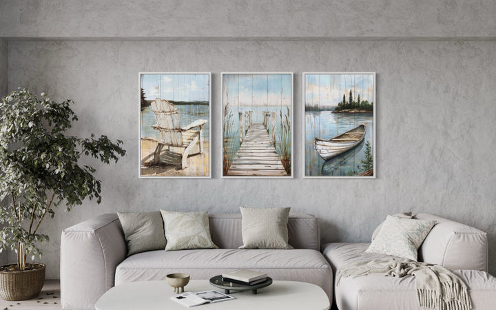 3 piece lake house wall art with fishing dock, boat, and chair.