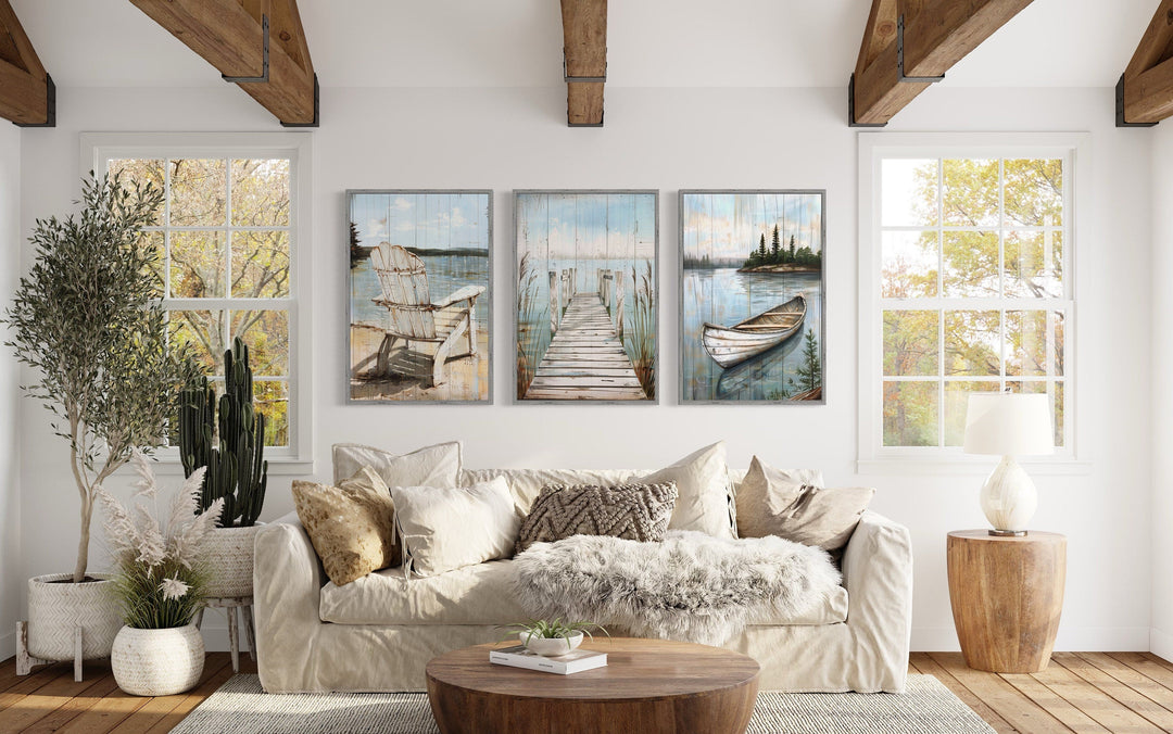 3 piece lake house wall art with fishing dock, boat, and chair.