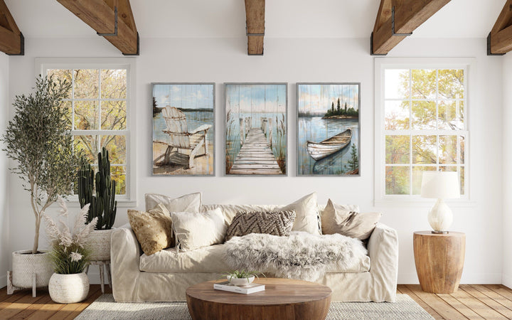 3 piece lake house wall art with fishing dock, boat, and chair.