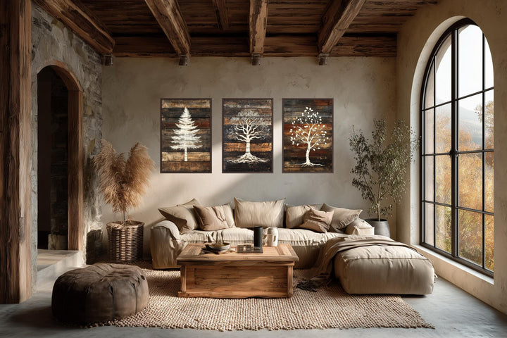 Set of 3 rustic pine, oak, and birch tree silhouettes on wood plank canvas wall art.