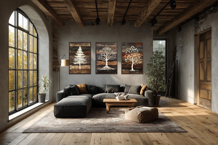Set of 3 rustic pine, oak, and birch tree silhouettes on wood plank canvas wall art.