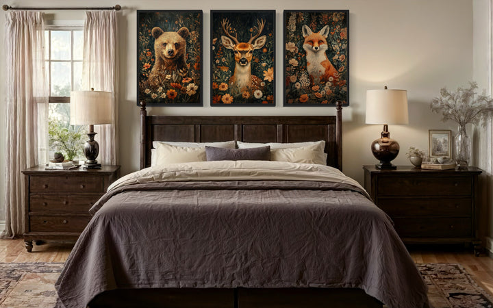 Set of 3 William Morris inspired wildlife prints of a bear, deer, and fox above a bed in a cabin.