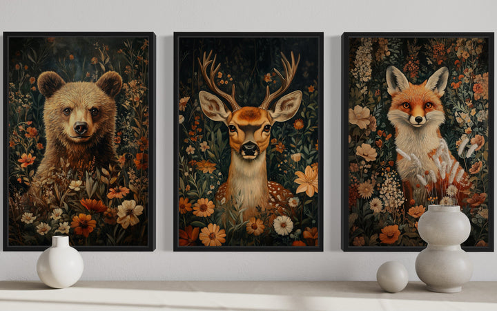 Set of 3 framed wildlife prints featuring a bear, deer, and fox among William Morris style flowers.