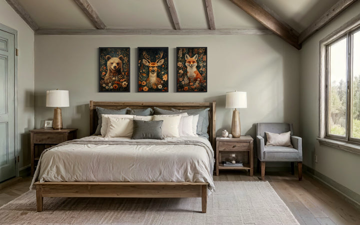 Set of 3 William Morris inspired wildlife art prints featuring a bear, deer, and fox above a bed.