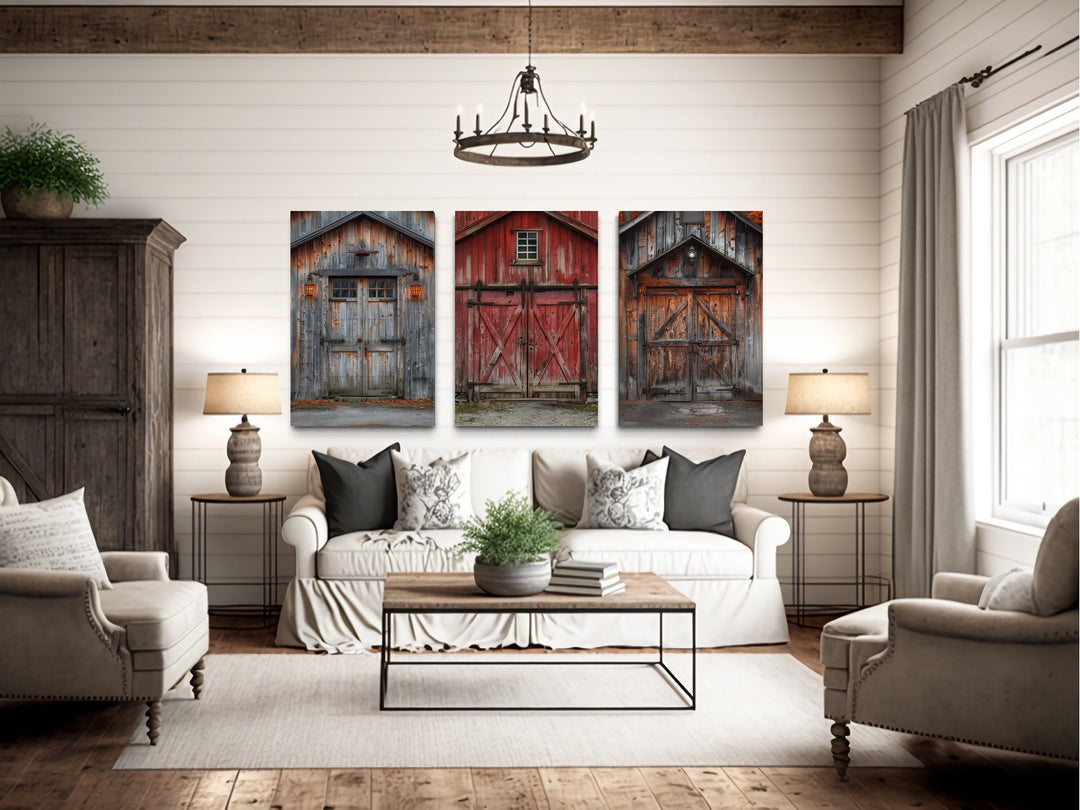 Set of three rustic barn door canvas paintings hanging above a white sofa in a farmhouse living room