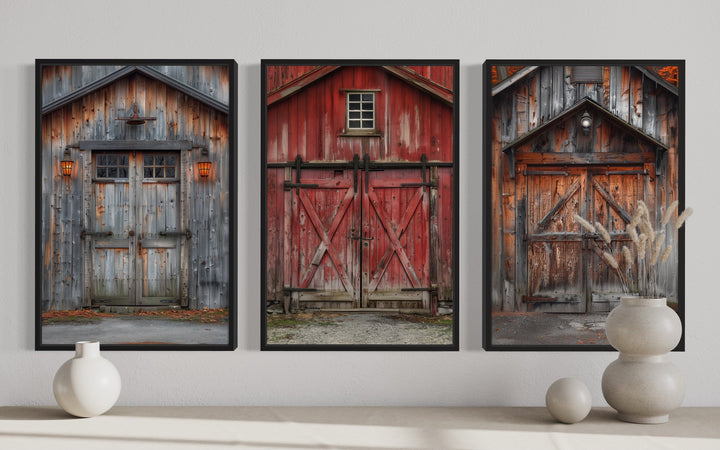 Set of three framed canvas wall art pieces featuring rustic weathered barn doors in red and gray.