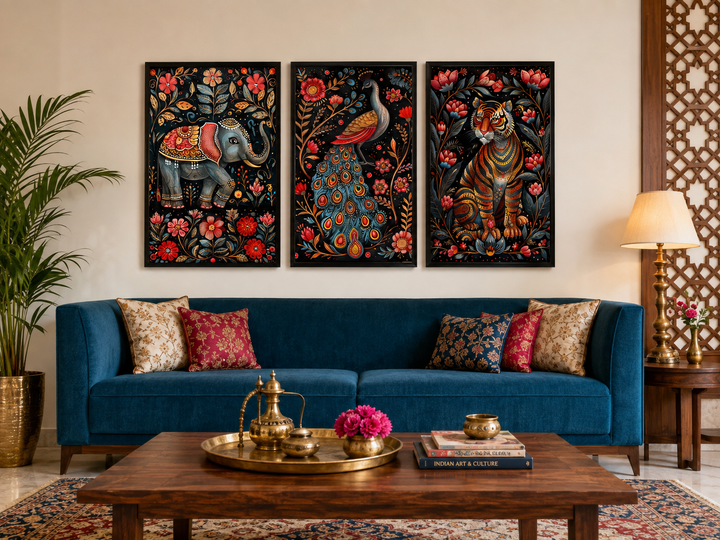 Set of three Madhubani style framed canvas wall art featuring a tiger, elephant, and peacock.