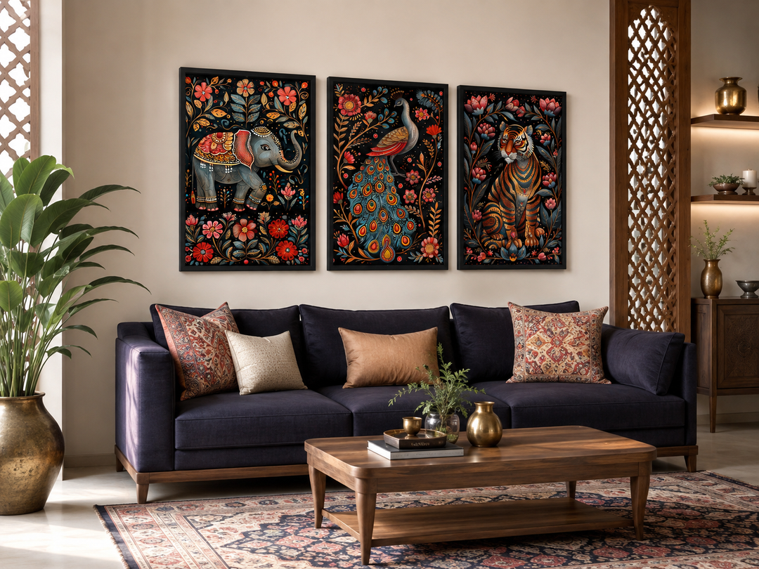 Set of three Madhubani style framed canvas wall art featuring a tiger, elephant, and peacock.