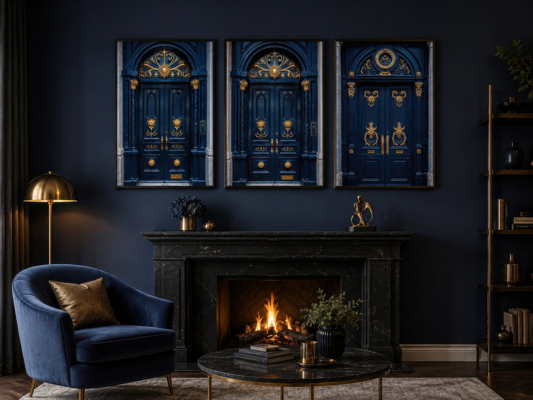 Set of three navy blue and gold European door canvas prints hanging above a black marble fireplace.