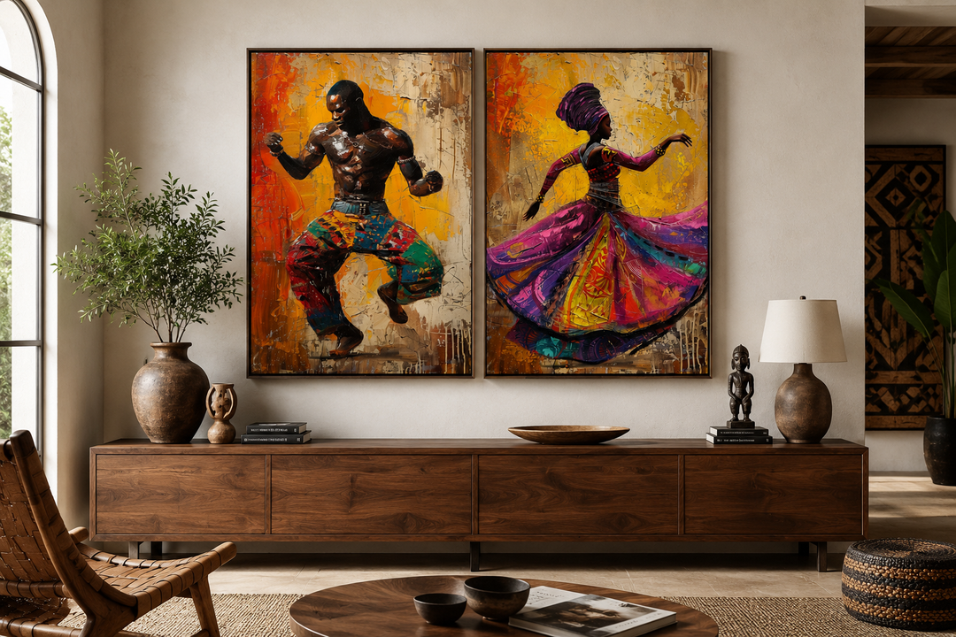 Two framed canvas prints of an African man and woman dancing in vibrant, traditional attire.