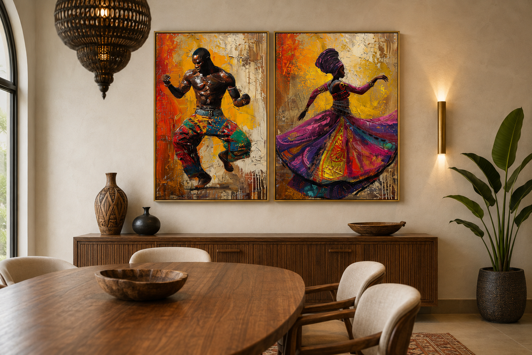 Set of two framed canvas prints featuring an African man and woman in traditional dance.
