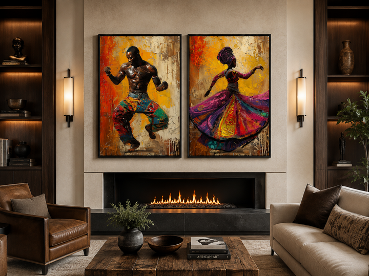 Two framed canvas prints of an African man and woman dancing, displayed above a modern fireplace.