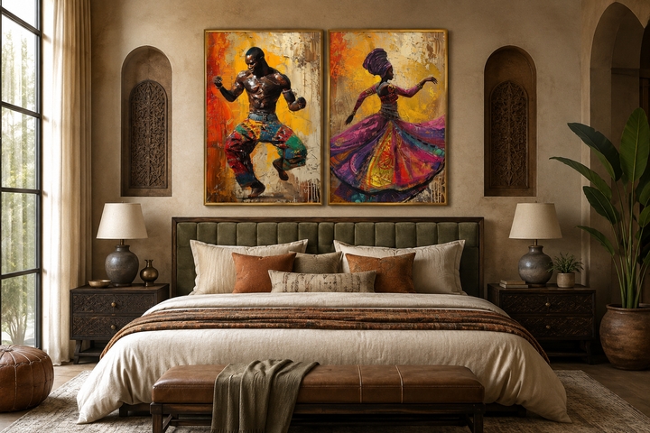 Set of two framed canvas prints featuring an African man and woman in traditional dance poses.