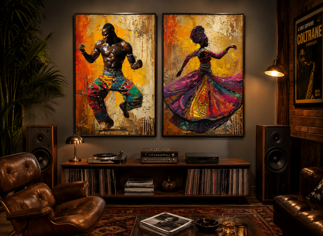 Set of two framed canvas prints featuring an African man and woman in traditional dance poses.