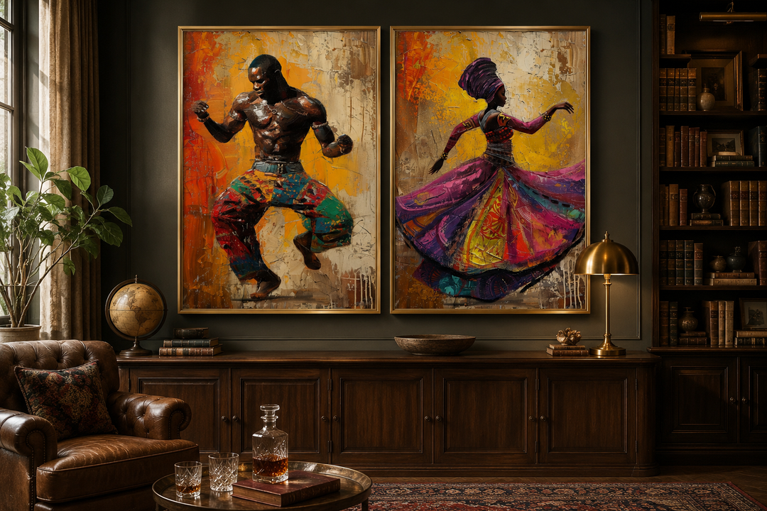Two framed canvas prints of an African man and woman in traditional dance on a dark wall.