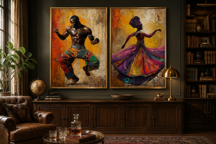 Two framed canvas prints of an African man and woman in traditional dance on a dark wall.