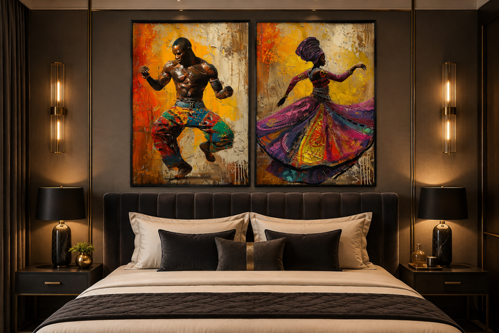 Two framed canvas prints of an African man and woman dancing over a bed in a modern bedroom.