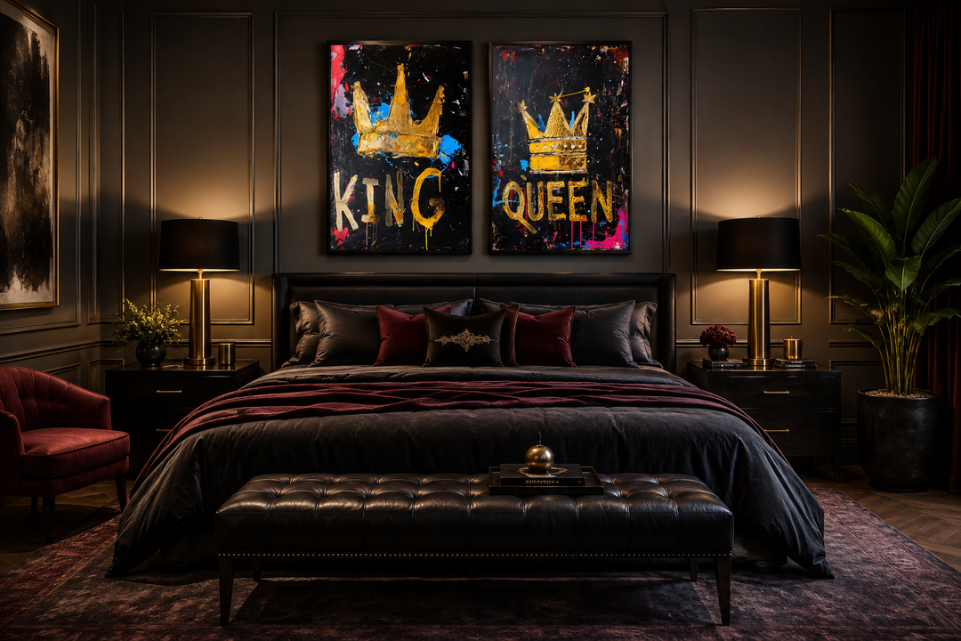 Set of 2 King and Queen crown pop art framed canvas prints above a bed in a dark bedroom.