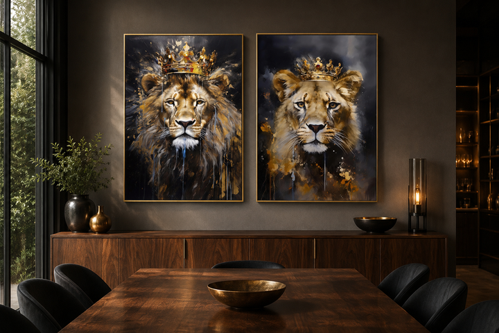 Set of two framed canvas prints featuring a lion and lioness wearing gold crowns on black backgrounds