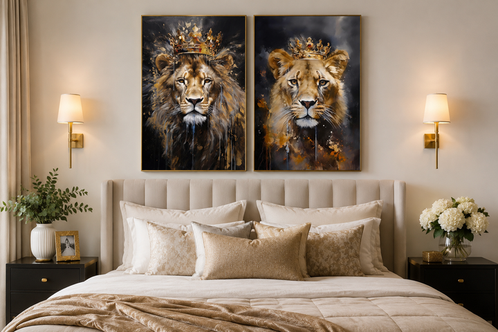 Set of two framed canvas prints featuring a lion and lioness with gold crowns above a bed.