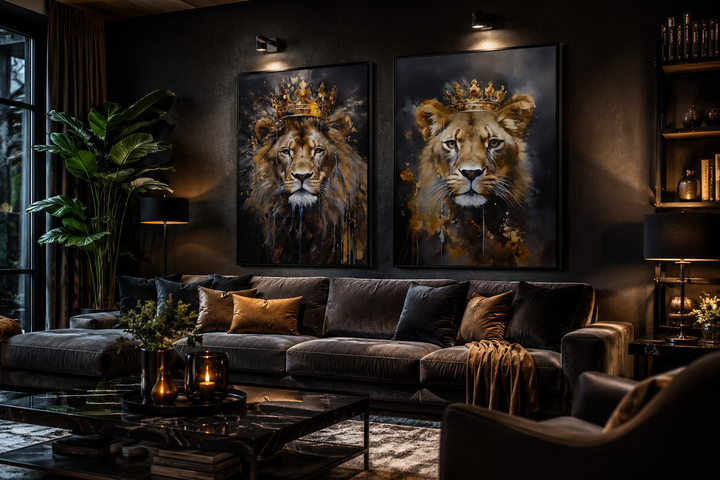 Set of two framed canvas prints featuring a lion and lioness wearing gold crowns on a black wall.