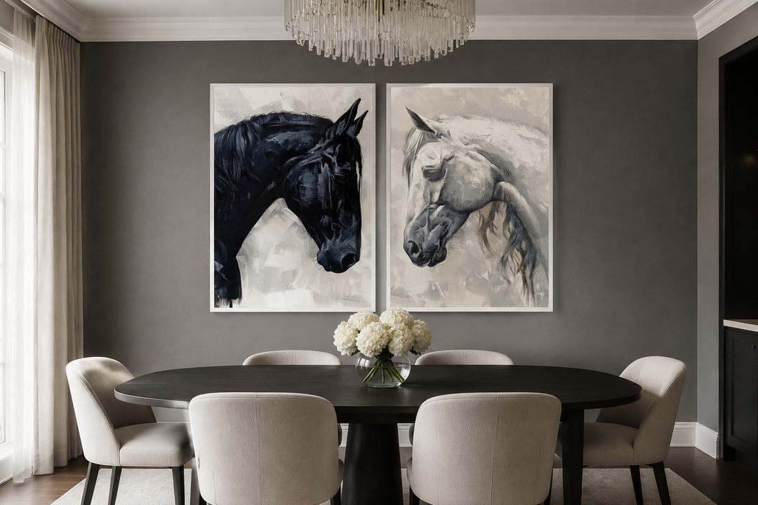 Set of two framed canvas prints featuring a black horse and a white horse in a dining room.