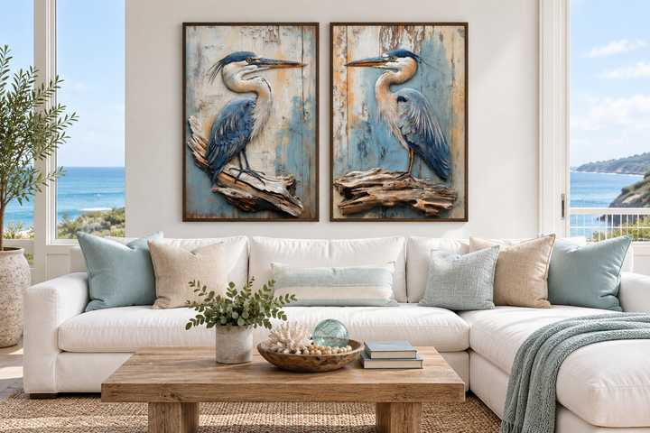 Set of 2 framed canvas wall art featuring blue herons on driftwood against a rustic wood background.