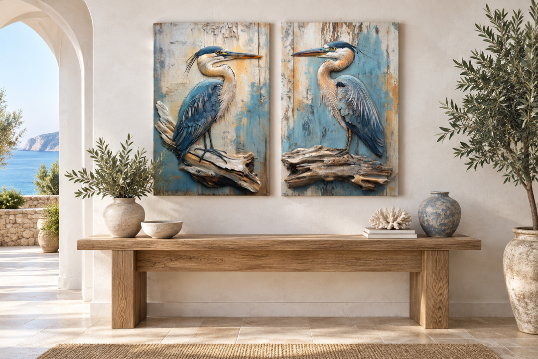 Set of 2 rustic blue herons on driftwood framed canvas wall art above a wooden console table.