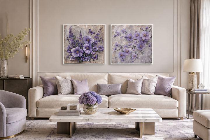 Set of 2 purple floral cherry blossom and butterfly canvas wall art prints above a cream sofa.