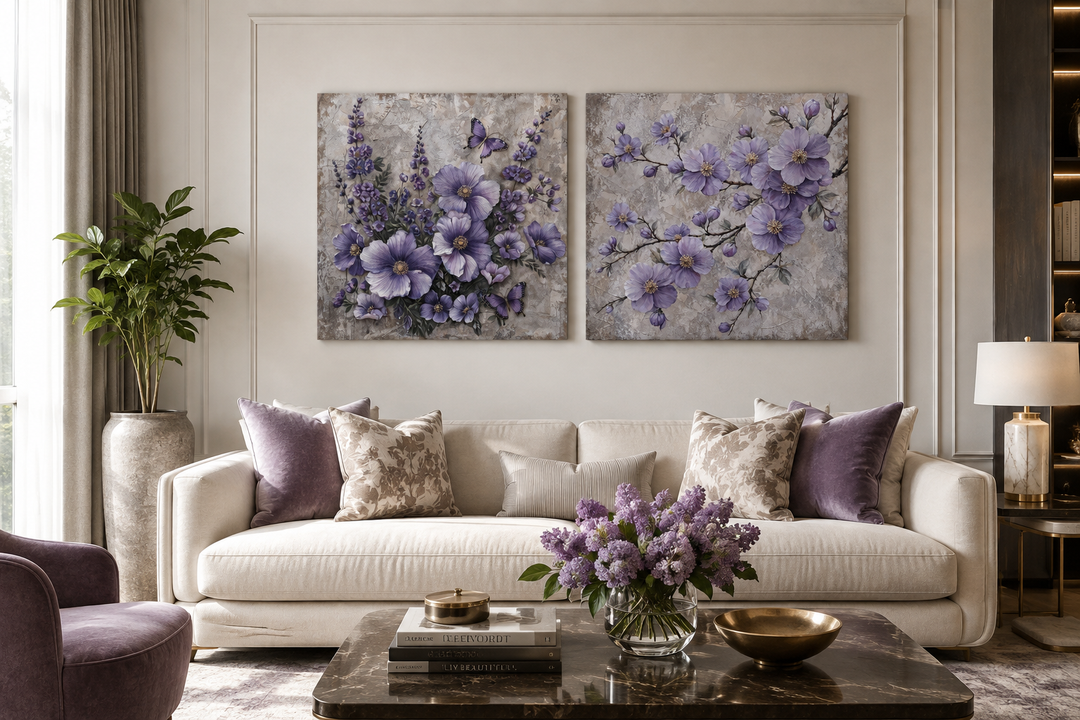 Set of 2 purple floral cherry blossom and butterfly canvas wall art above a white sofa.
