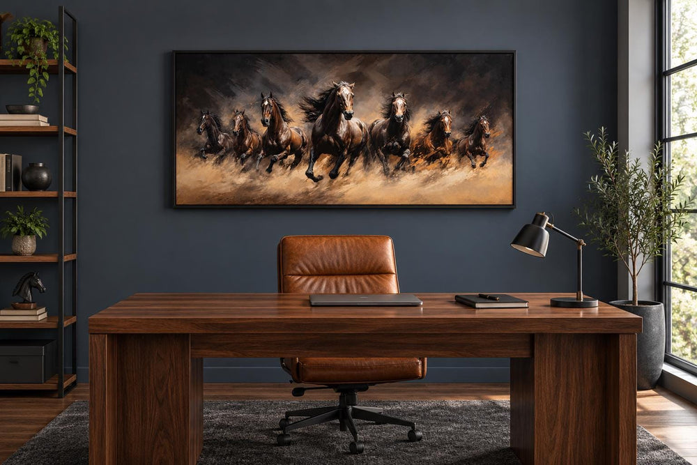 Seven wild horses galloping through dust framed canvas wall art above a desk in a home office.