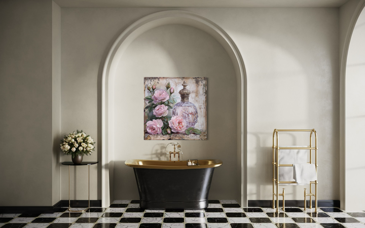 Shabby chic framed canvas wall art of a vintage perfume bottle and pink roses in a luxury bathroom.