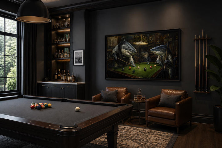 Shark Playing Pool Billiards Wall Art canvas in a dark, modern game room above leather armchairs.