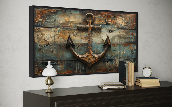 Nautical framed canvas wall art featuring a rusty ship's anchor painted on weathered wood panels.