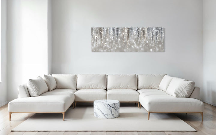 Silver beige abstract rain canvas print in a horizontal orientation above a modern white sofa.