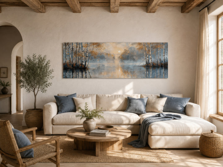 Silver birch trees forest long narrow horizontal wall art above a sofa in a neutral living room.
