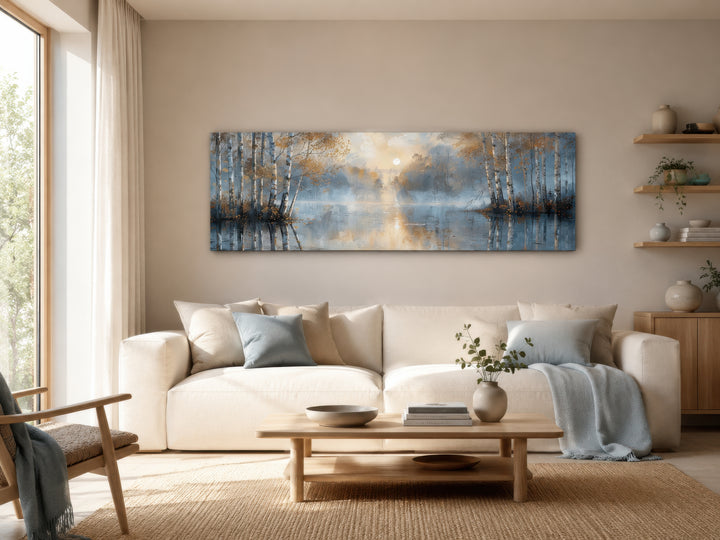 Panoramic silver birch forest wall art in a modern living room above a cream sofa.