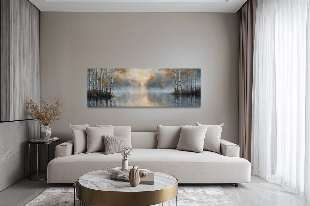 Silver birch trees forest long narrow horizontal wall art hanging above a modern beige sofa.