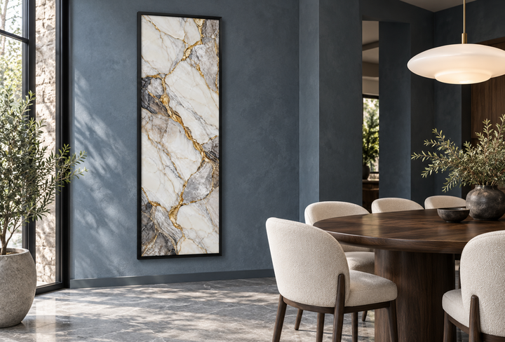 Vertical silver and gold marble wall art with ivory formations and gold veins in a black frame.