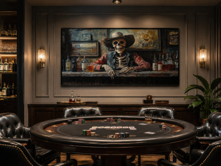 Skeleton cowboy barman framed canvas wall art hanging above a poker table in a home bar.
